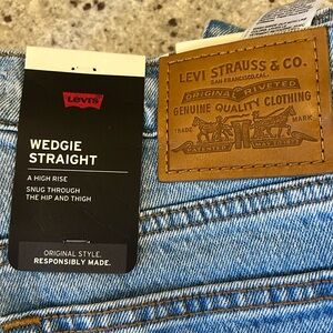 Levi’s wedgie straight jeans in a light wash (unsure of name of color)
